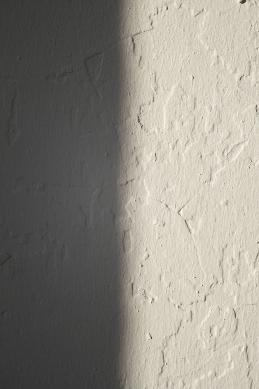 rough concrete wall of white color WHY DOES YOUR HOUSE CLADDING MATTER?