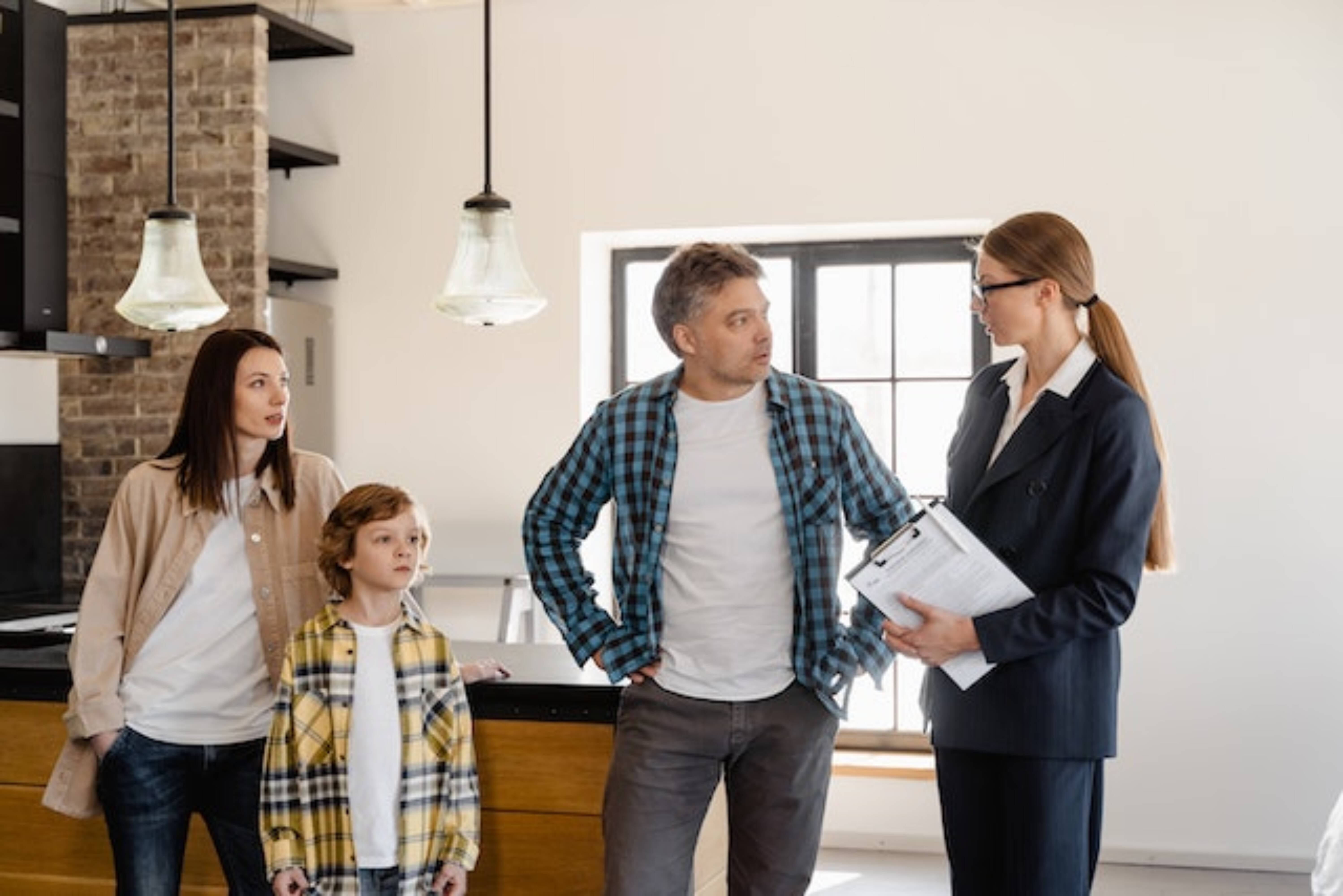 Family talking to a realtor in Ontario.