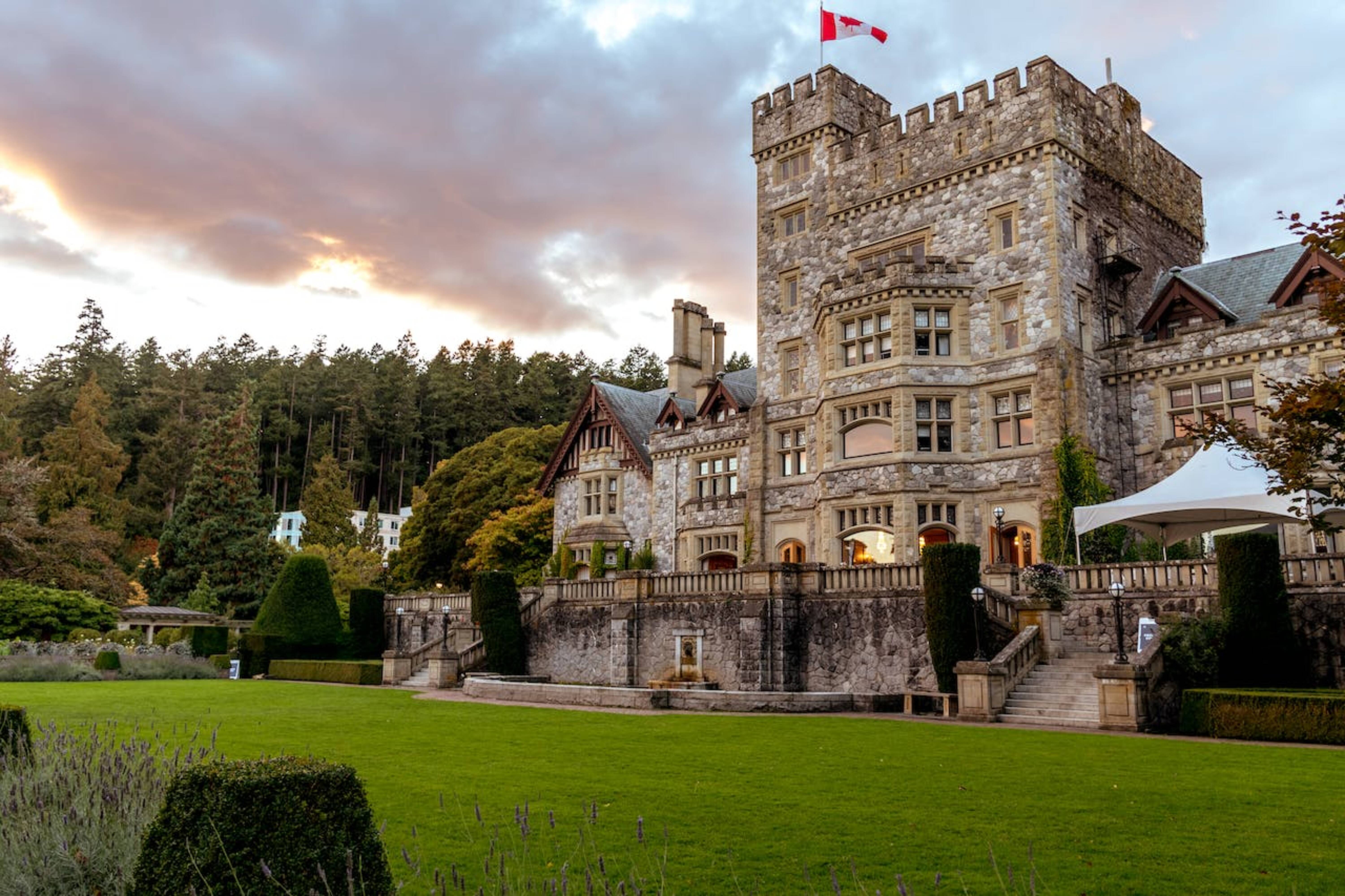 A historic building in Canada with a large lawn.
