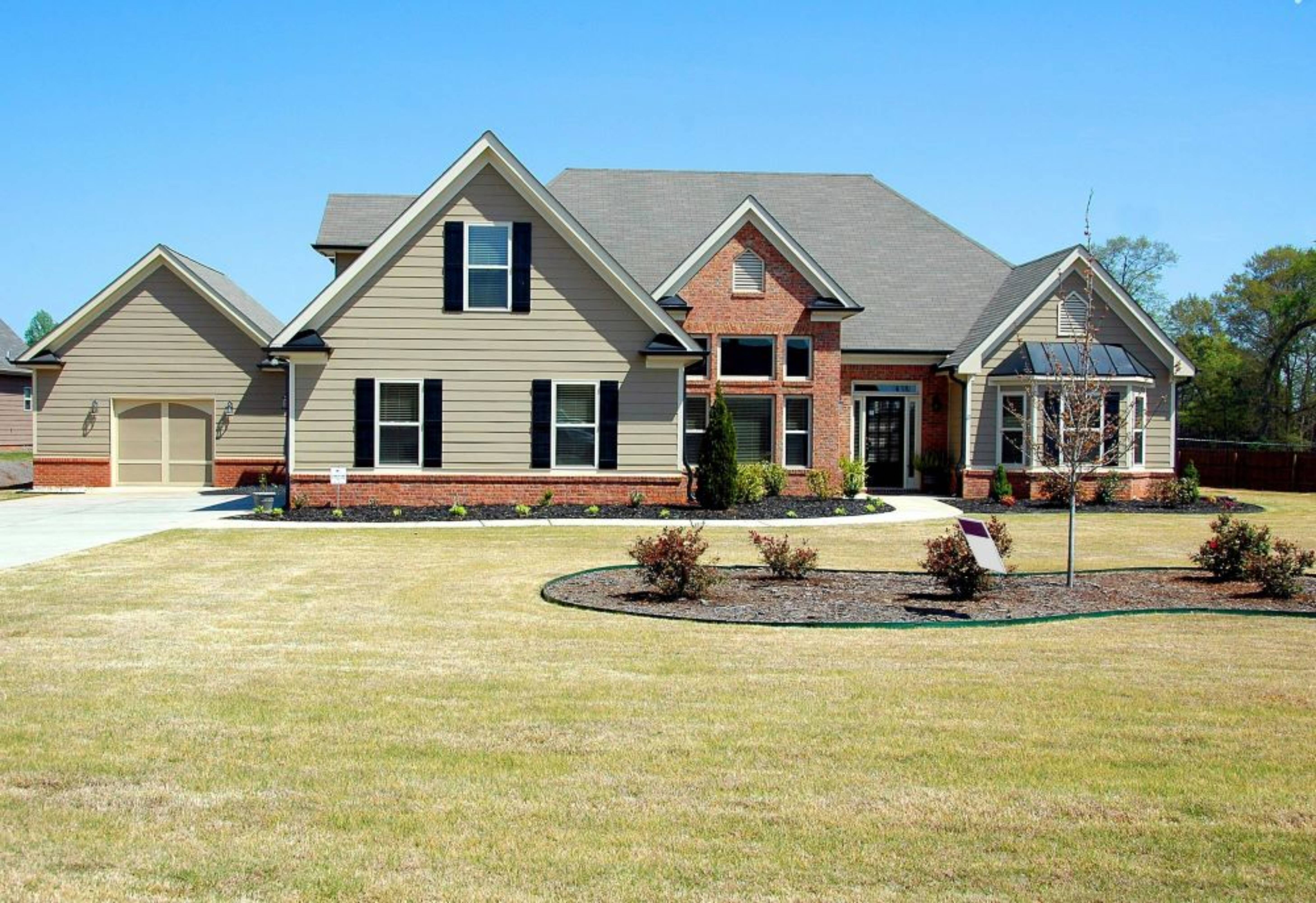 A brown house in sunlight.