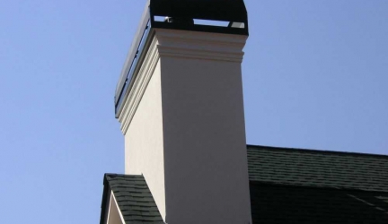 Chimney Restoration Stucco and architectural mouldings